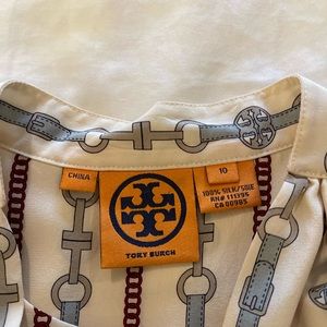 Selling a sleeveless Tori Burch shirt with attached bow